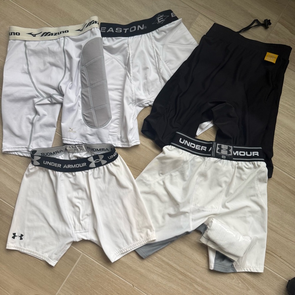 Under Armour and Mizuno Compression Shorts Set 3 Youth XL and 2 Youth Medium